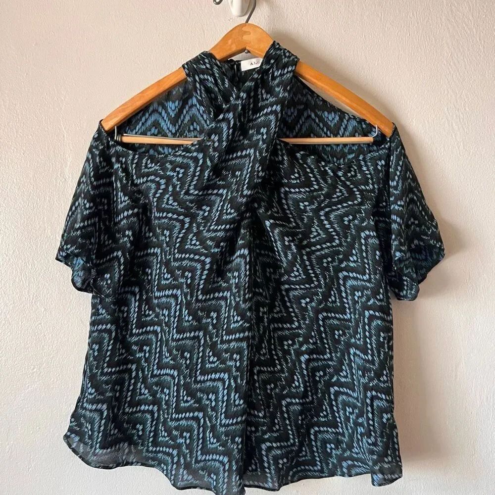A.L.C. blouse features a distinctive blue and black geometric chevron print and